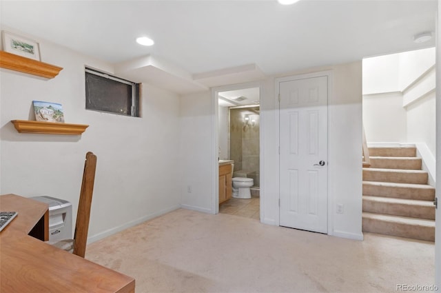 office space with light carpet, recessed lighting, and baseboards