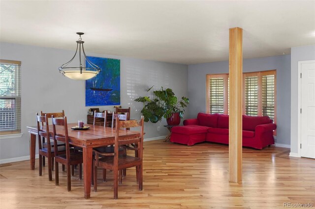 10200 Julian St, Westminster, CO 80031 - dining room with baseboards and light wood finished floors