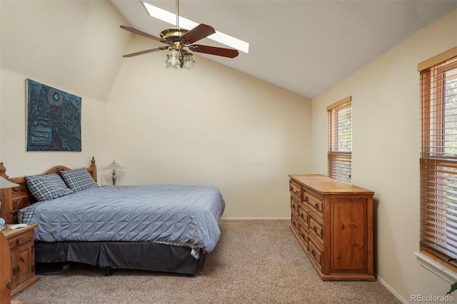 10200 Julian St, Westminster, CO 80031 - bedroom featuring a skylight, light carpet, baseboards, and high vaulted ceiling