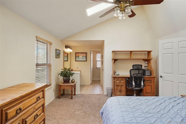 10200 Julian St, Westminster, CO 80031 - bedroom with lofted ceiling, light tile patterned floors, baseboards, light colored carpet, and ceiling fan