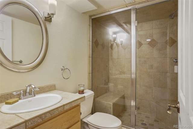 10200 Julian St, Westminster, CO 80031 - full bath with vanity, a shower stall, and toilet