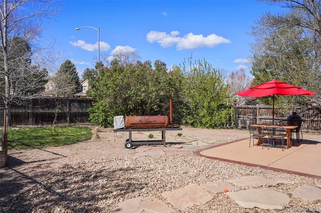 10200 Julian St, Westminster, CO 80031 - exterior space featuring a fenced backyard and a patio area