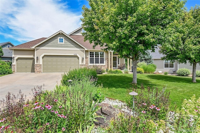 6696 S Quail Ct, Littleton, CO 80127 - view of front of house featuring an attached garage, a front lawn, concrete driveway, stone siding, and roof with shingles