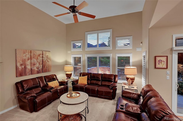 6696 S Quail Ct, Littleton, CO 80127 - carpeted living room with high vaulted ceiling and ceiling fan