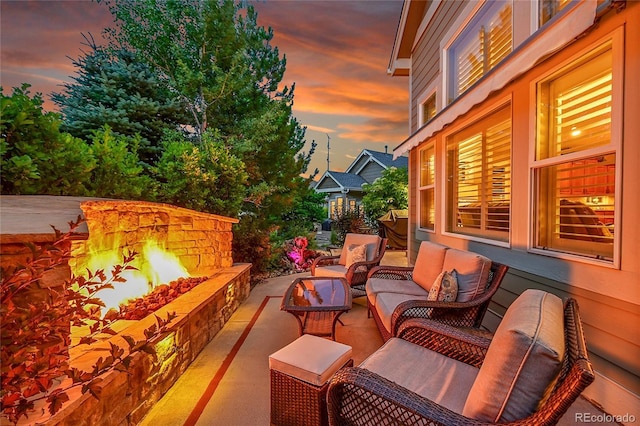 6696 S Quail Ct, Littleton, CO 80127 - view of patio / terrace with an outdoor living space with a fire pit