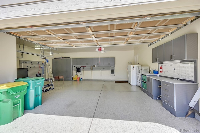 6696 S Quail Ct, Littleton, CO 80127 - garage with freestanding refrigerator