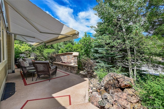 6696 S Quail Ct, Littleton, CO 80127 - view of patio featuring an outdoor living space