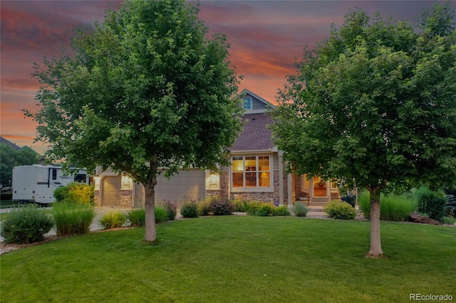 6696 S Quail Ct, Littleton, CO 80127 - obstructed view of property featuring stone siding, a front lawn, an attached garage, and roof with shingles