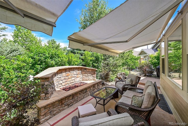 6696 S Quail Ct, Littleton, CO 80127 - view of patio featuring an outdoor living space