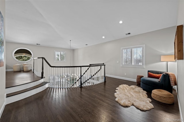 living area featuring dark hardwood / wood-style floors