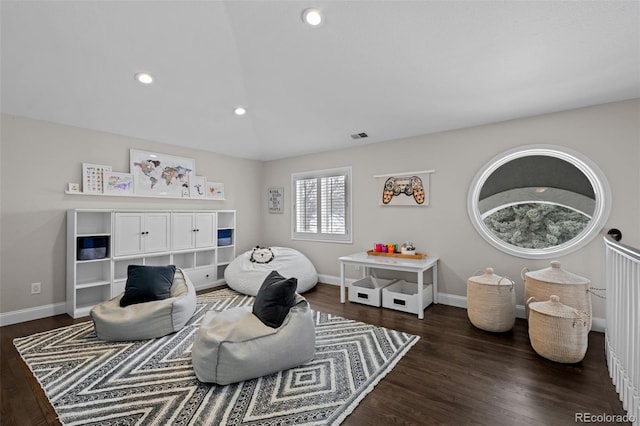 living room featuring dark wood-type flooring