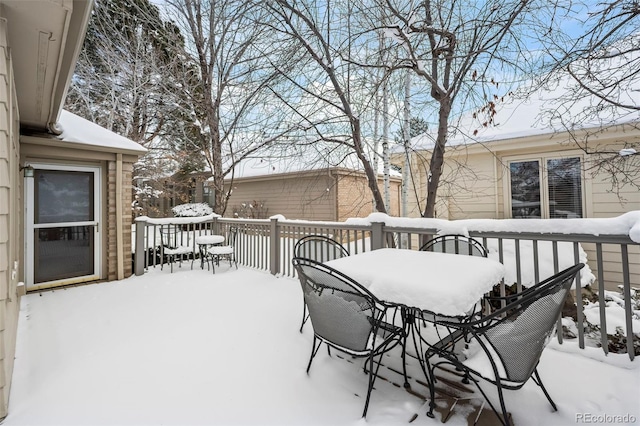 view of snow covered deck