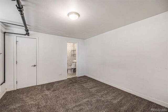 500 E 11th Ave Unit 102, Denver, CO 80203 - carpeted spare room featuring baseboards
