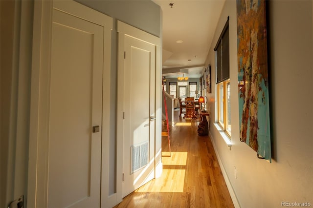 hall featuring light wood-type flooring