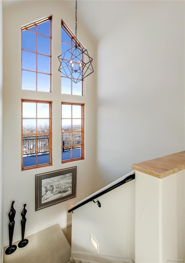 stairway with a high ceiling