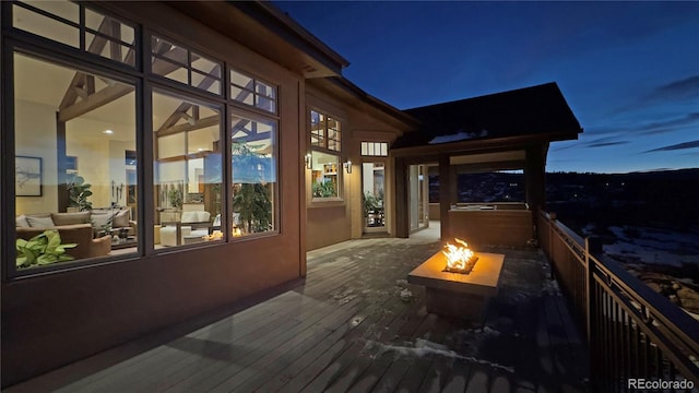 exterior space with an outdoor fire pit