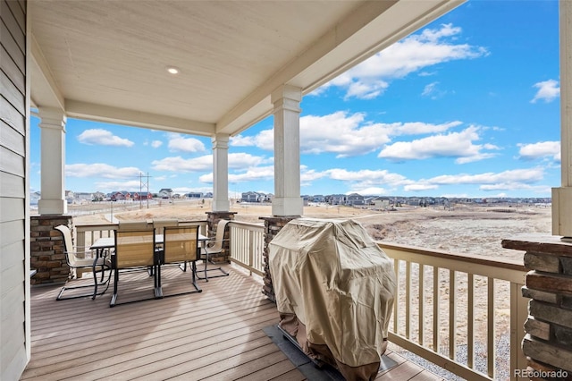 12664 Ulster St, Thornton, CO 80602 - wooden deck with outdoor dining area