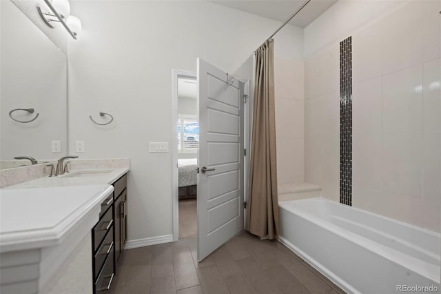 12664 Ulster St, Thornton, CO 80602 - full bath featuring vanity, shower / bath combo with shower curtain, and ensuite bath