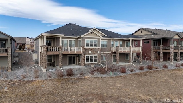 12664 Ulster St, Thornton, CO 80602 - back of property featuring a patio area