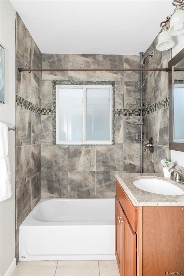 bathroom with shower / tub combination, vanity, and tile patterned flooring