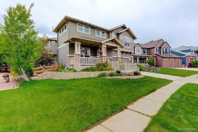 14200 W 86th Pl, Arvada, CO 80005 - craftsman house with a porch, a front lawn, concrete driveway, and stone siding