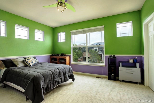 14200 W 86th Pl, Arvada, CO 80005 - carpeted bedroom with ceiling fan and baseboards