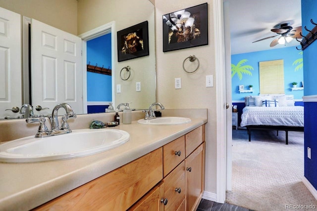 14200 W 86th Pl, Arvada, CO 80005 - bathroom featuring ensuite bath, double vanity, and a ceiling fan