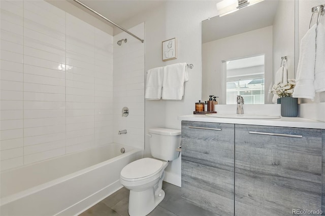 bathroom featuring vanity, toilet, and shower / bathtub combination