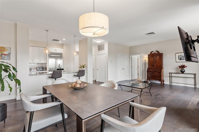 2500 E Cherry Creek S Drive 313, Denver, CO 80209 - dining space with dark wood-type flooring, recessed lighting, and baseboards