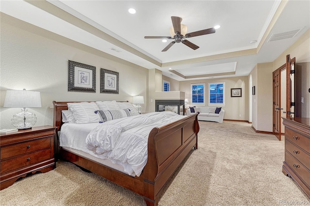 10459 Rivington Ct, Lone Tree, CO 80124 - bedroom with a tray ceiling, light colored carpet, ceiling fan, baseboards, and recessed lighting
