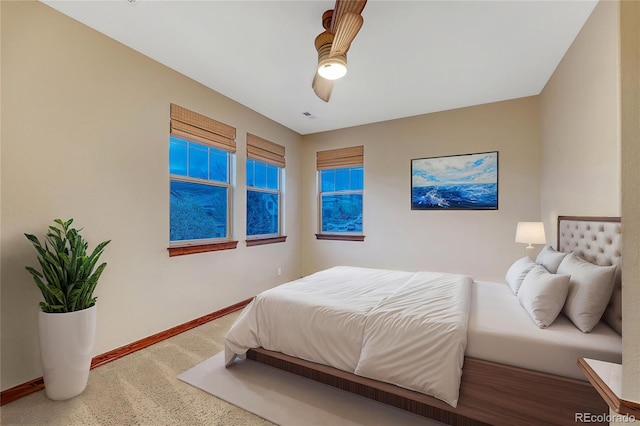 10459 Rivington Ct, Lone Tree, CO 80124 - carpeted bedroom with baseboards and a ceiling fan