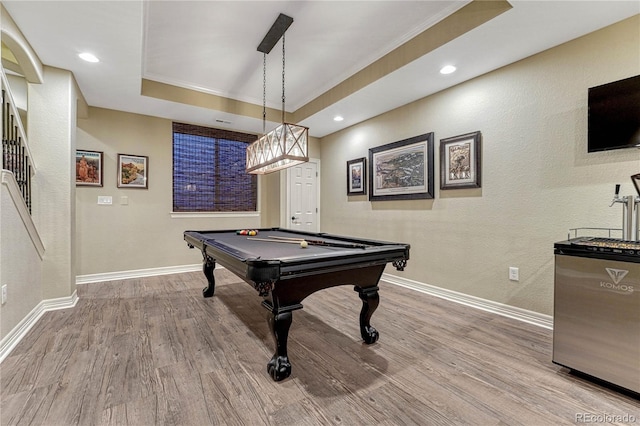 10459 Rivington Ct, Lone Tree, CO 80124 - rec room featuring wood finished floors, pool table, baseboards, crown molding, and a tray ceiling