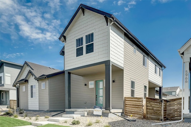 view of front of house with fence