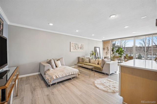 bedroom featuring ornamental molding, light wood-type flooring, recessed lighting, and baseboards