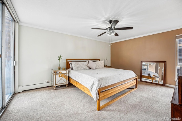 carpeted bedroom featuring ornamental molding, a baseboard radiator, a ceiling fan, and baseboards