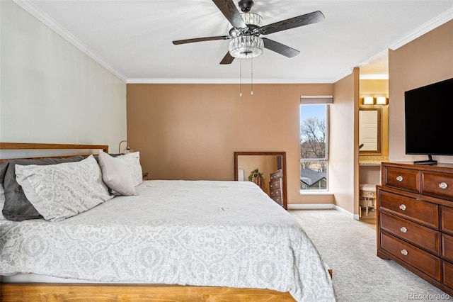 carpeted bedroom featuring baseboards, a ceiling fan, and crown molding