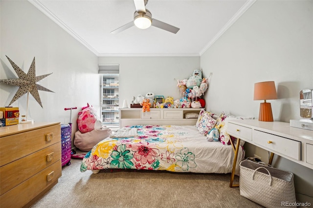 carpeted bedroom with ceiling fan and crown molding