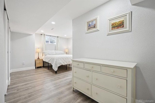 bedroom featuring light hardwood / wood-style flooring