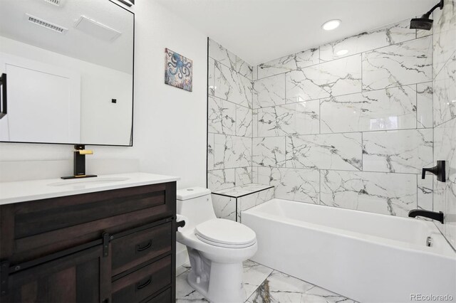 full bathroom featuring toilet, vanity, and tiled shower / bath combo