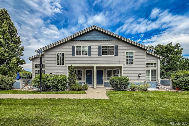 1419 Red Mountain Dr Unit 126, Longmont, CO 80504 - view of front of property featuring a front yard and a porch