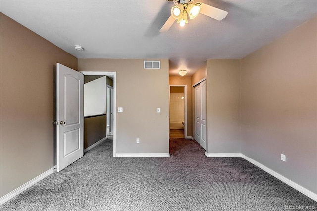 1419 Red Mountain Dr Unit 126, Longmont, CO 80504 - unfurnished bedroom featuring carpet, ceiling fan, and a closet