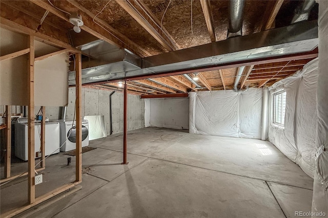 1419 Red Mountain Dr Unit 126, Longmont, CO 80504 - basement featuring independent washer and dryer