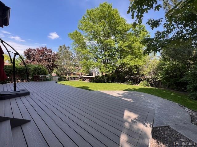 7636 S Allison Ct, Littleton, CO 80128 - deck featuring a yard