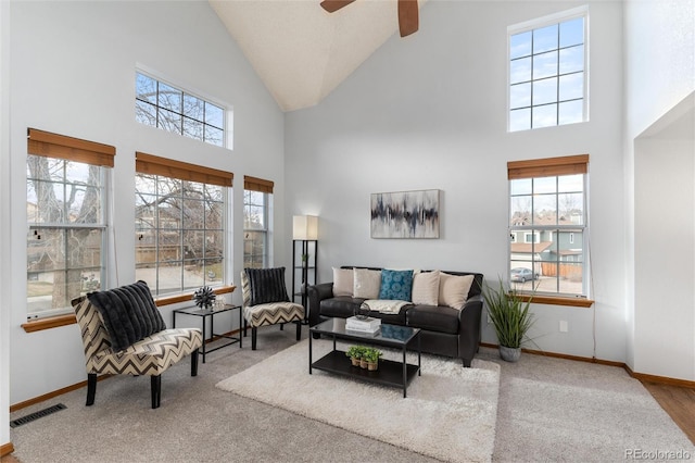 7636 S Allison Ct, Littleton, CO 80128 - carpeted living room with high vaulted ceiling and ceiling fan