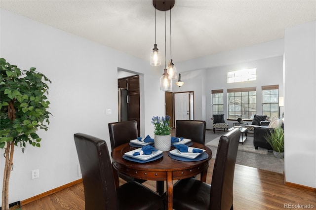 7636 S Allison Ct, Littleton, CO 80128 - dining area with wood finished floors