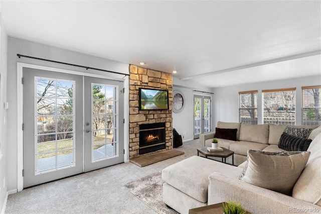 7636 S Allison Ct, Littleton, CO 80128 - living area with french doors, carpet flooring, and healthy amount of natural light