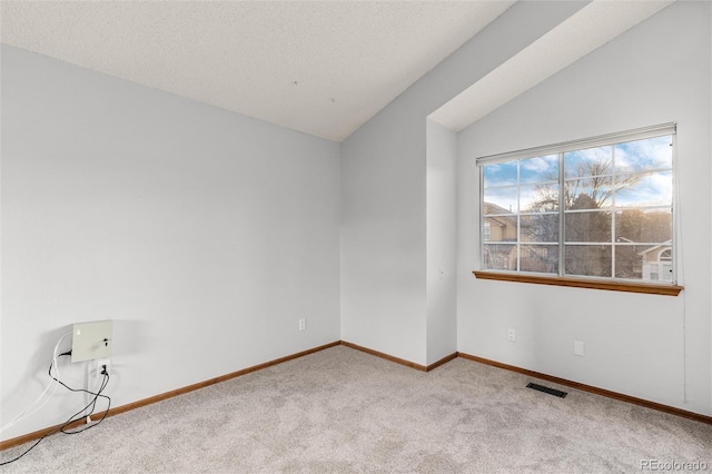 7636 S Allison Ct, Littleton, CO 80128 - empty room with carpet floors and vaulted ceiling