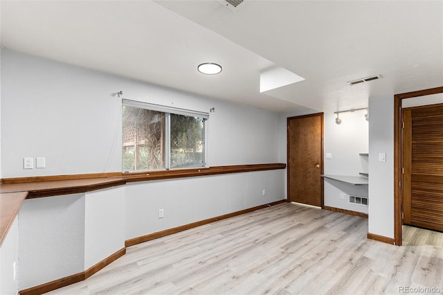7636 S Allison Ct, Littleton, CO 80128 - unfurnished room featuring wood finished floors and baseboards