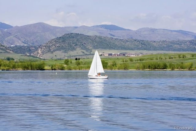 7636 S Allison Ct, Littleton, CO 80128 - water view featuring a mountainous background