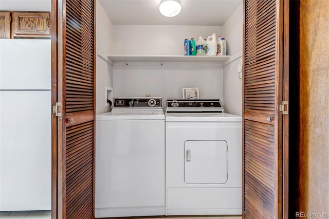 laundry area with washer and dryer